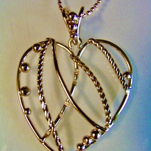 14K yellow gold "Complicated Heart" $295