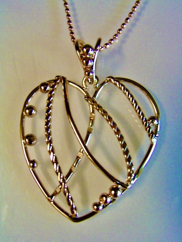 14K yellow gold "Complicated Heart" $295